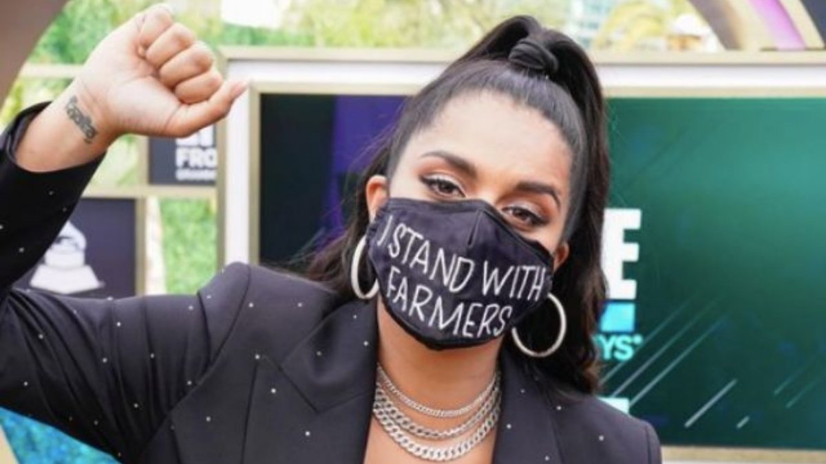 Lilly Singh wears 'I Stand With Farmers' mask at 2021 Grammys