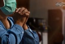 Lady wearing mask and Praying to God