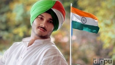 A young man wearing tricolour turban