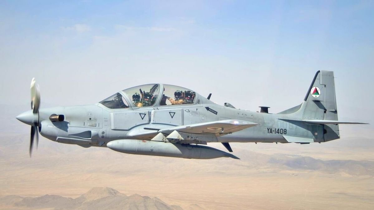 An Afghan Air Force Embraer EMB 314 flies Over Kabul, Afghanistan