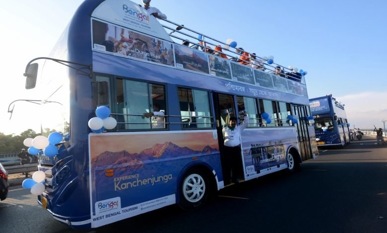 Kolkata: West Bengal Chief Minister Mamata Banerjee inaugurated two open-roof double-decker buses in Kolkata, much like London's iconic red double-decker buses that have become a national symbol of England; on Oct 13, 2020. As of now these two open-roof buses will be used for Puja Parikrama but later they will be used to promote tourism in Kolkata. The double-decker buses were first introduced in Kolkata in the 1920s. But slowly, the erstwhile Left Front government phased them out in the early 1990s. The last bus went off city roads in 2005. According to West Bengal transport department officials, the new blue-coloured buses will have modern features like automatic doors, CCTV cameras, panic buttons and destination boards. Each one will have altogether 51 seats of which 16 would be on the upper deck. (Photo: IANS)