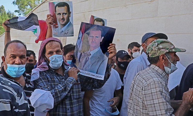 Syrians Head to the Polls Amid Ongoing Civil War and Calls for Boycott